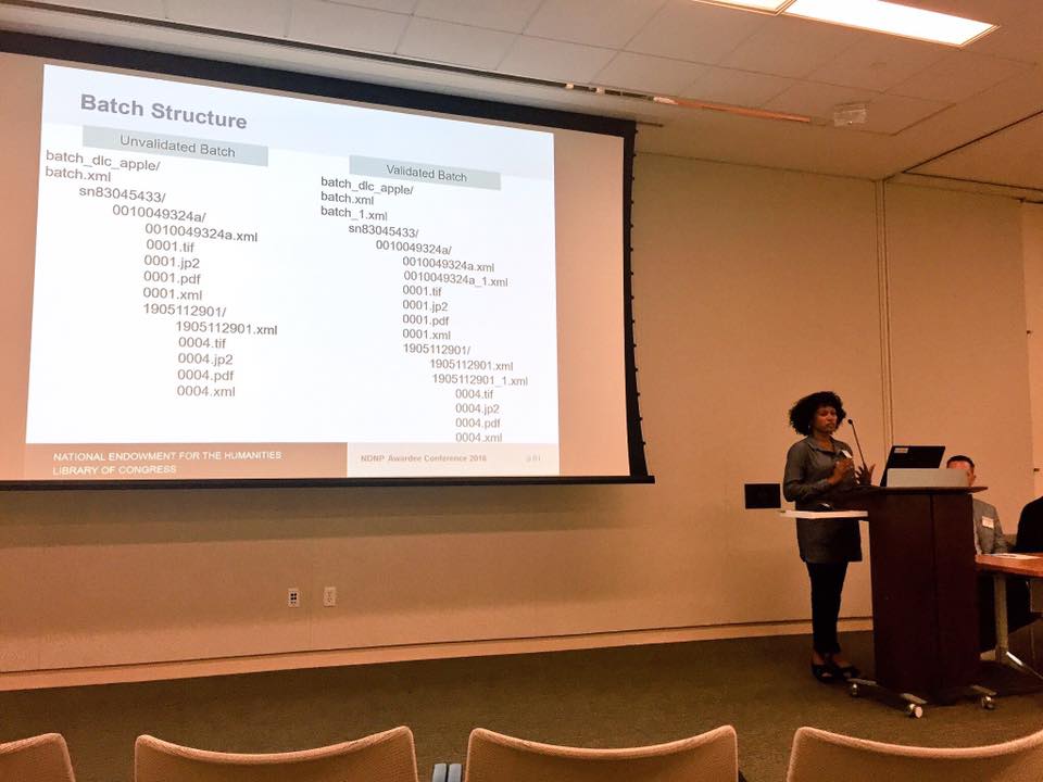 Leaning about the technical specifications for the NDNP with Tonijala Penn from the Library of Congress. Courtesy of Justin Clark.