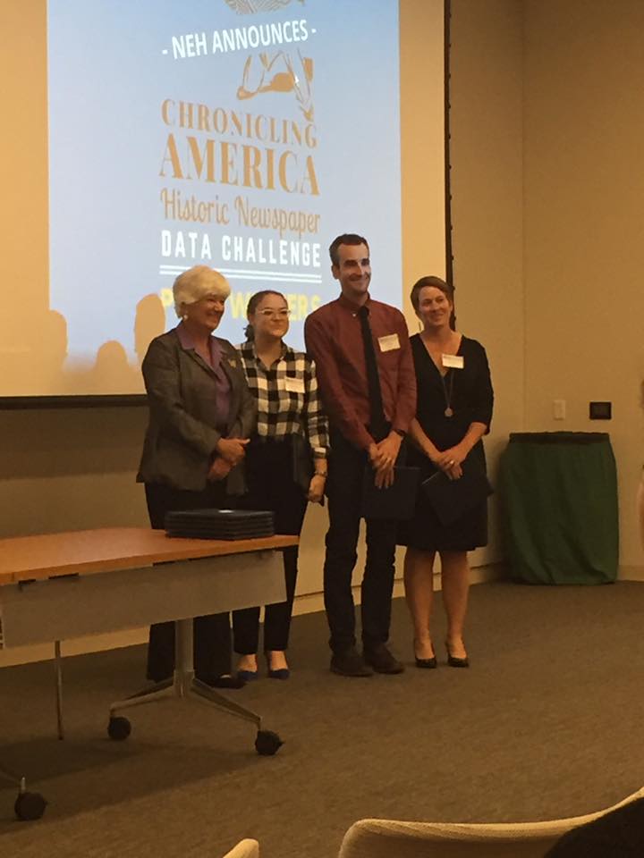 IUPUI librarians Caitlyn Pollack, Ted Polley, and Kristi Palmer accepting their NDNP Data Challenge Award for their work on "Chronicling Hoosier." Courtesy of Justin Clark.