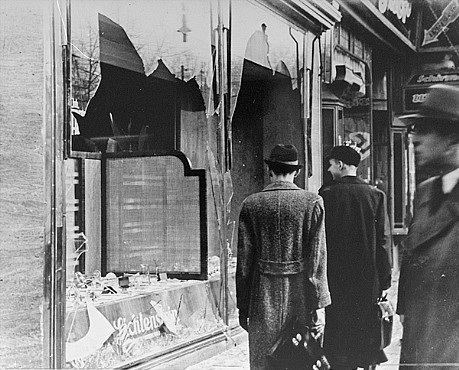 "Shattered storefront of a Jewish-owned shop destroyed during Kristallnacht," photograph, November 10, 1938, National Archives and Records Administration, accessed United States Holocaust Memorial Museum.