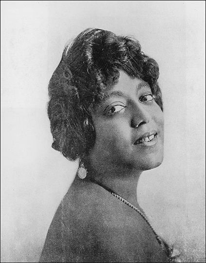 "A studio headshot portrait of American blues singer Mamie Smith," photograph, circa, 1923, Frank Driggs Collection/Getty Images accessed "Mamie Smith and the Birth of the Blues Market," All Things Considered, NPR, http://www.npr.org/2006/11/11/6473116/mamie-smith-and-the-birth-of-the-blues-market